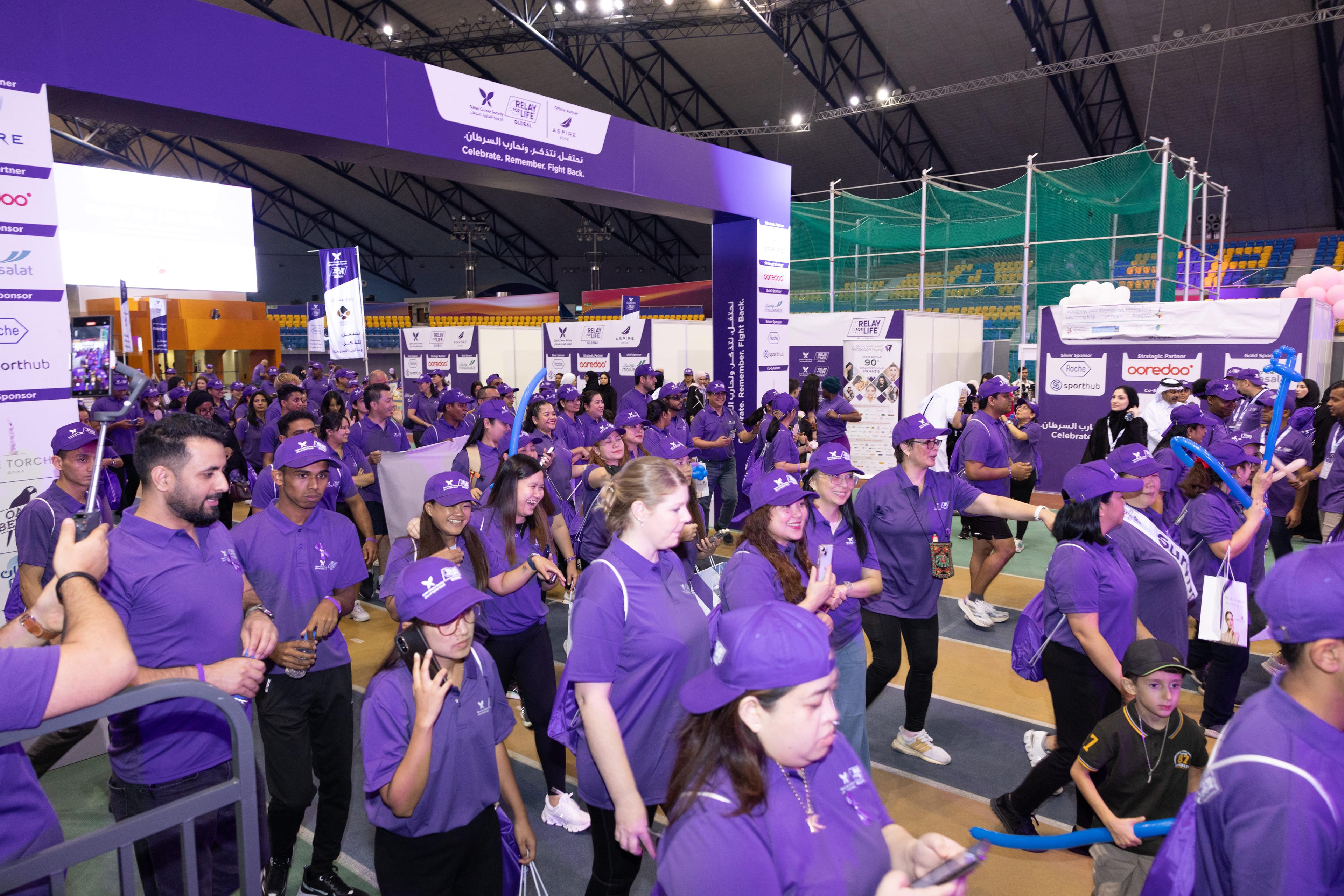 Relay For Life Qatar participants walking together at the event